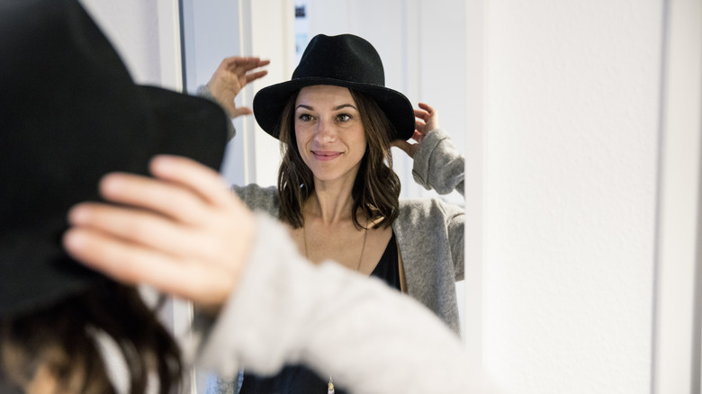 A woman with a black hat