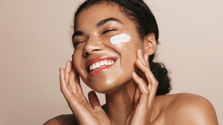 Woman applying product