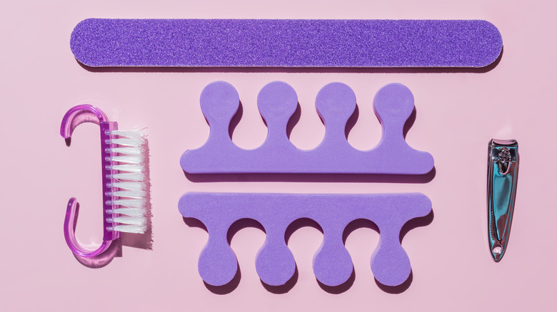 Purple pedicure tools layed out