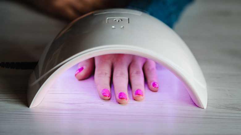 UV lamp drying pink nails