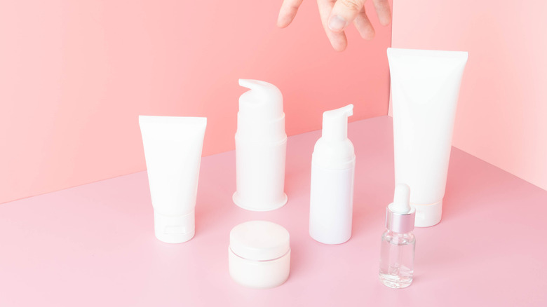 Multiple skincare bottles.