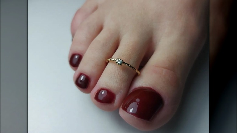 A burgundy pedicure