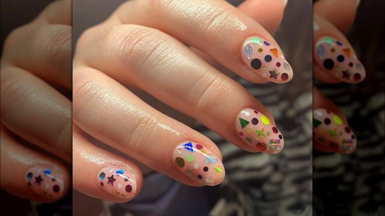 nude nails with confetti glitter