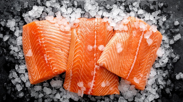 Raw salmon filets on ice