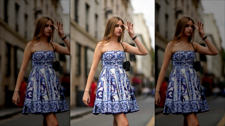 woman wearing navy blue printed dress