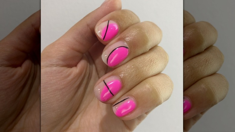Pink, black negative space manicure