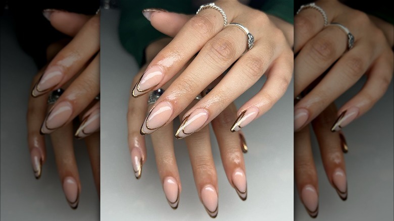 negative space French manicure in gold 