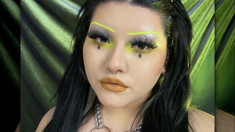 Neon yellow eyebrow makeup