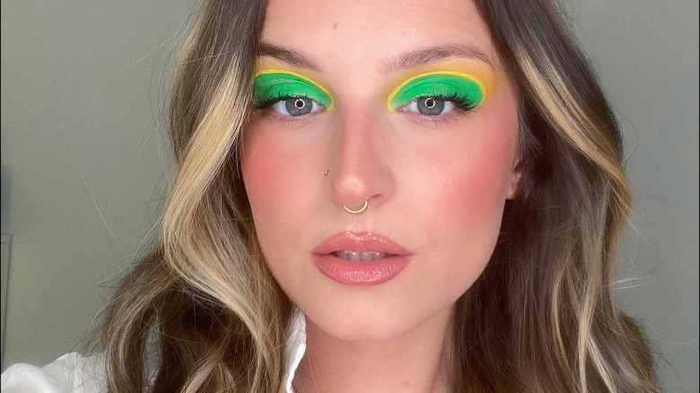 Rounded green and yellow makeup