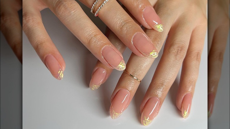 Gold chrome manicure
