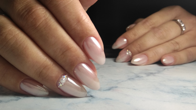 Sheer, shiny pale pink nails 