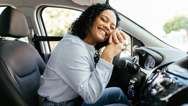 Woman sitting in her car