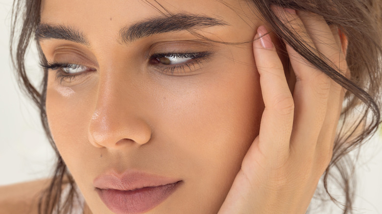 Woman showing off her eyebrows