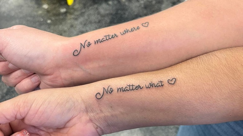 Matching friend tattoos