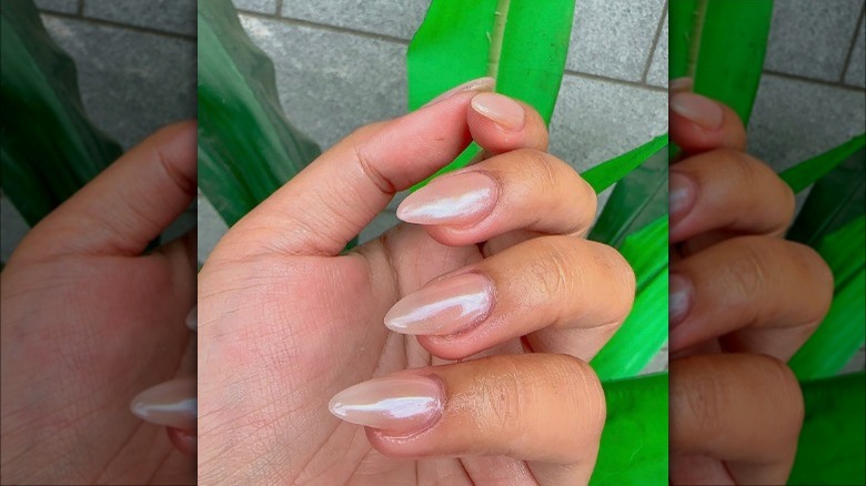 close up of nude chrome nails