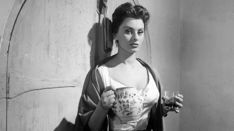 Sophia Loren holding a glass