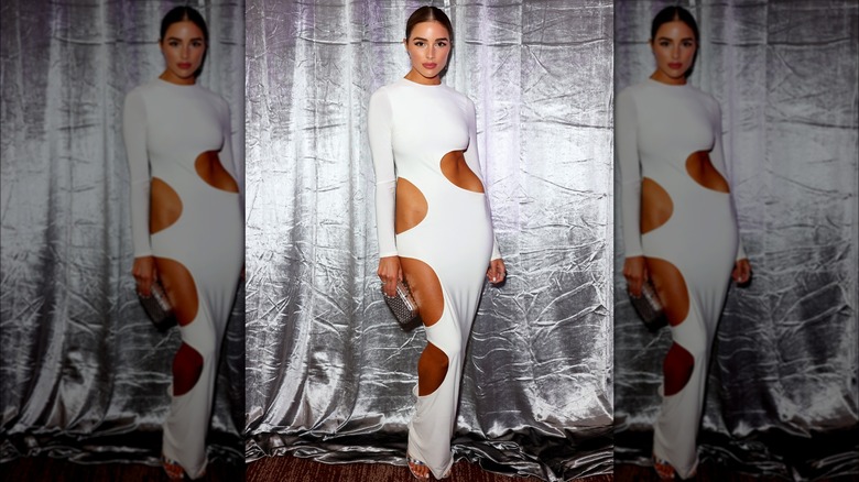 Olivia Culpo white dress with cutouts