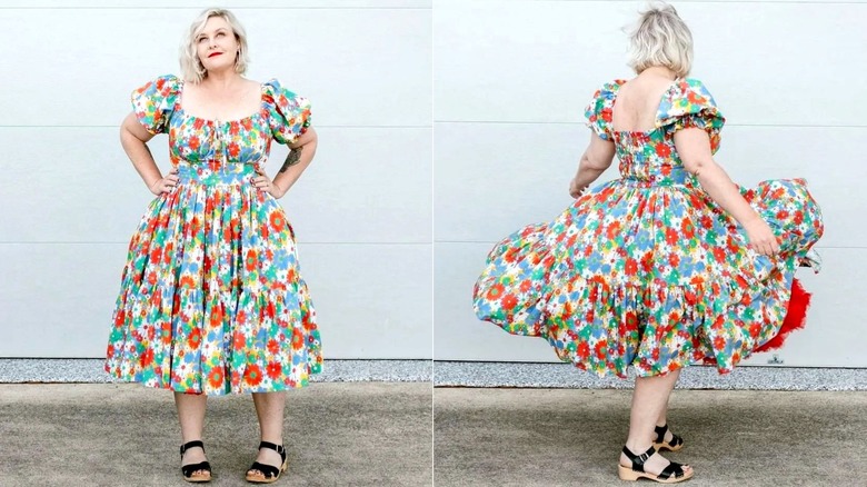 Woman wearing bright floral milkmaid dress