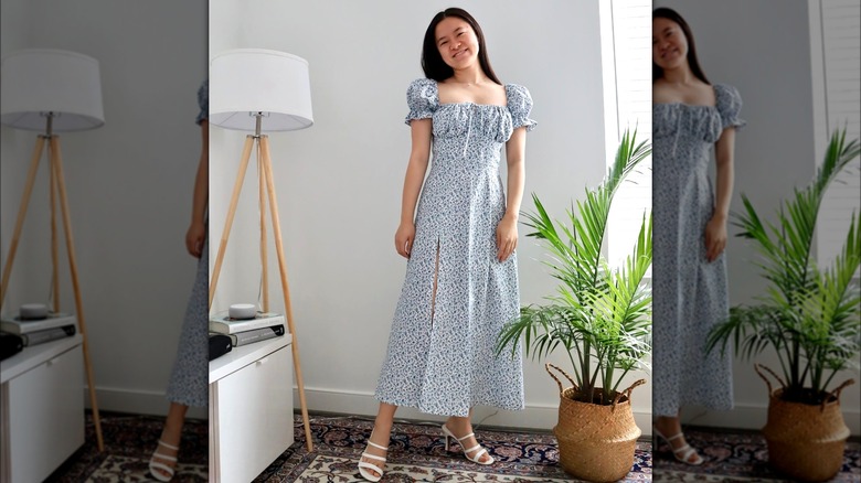 Woman wearing blue ditsy milkmaid dress