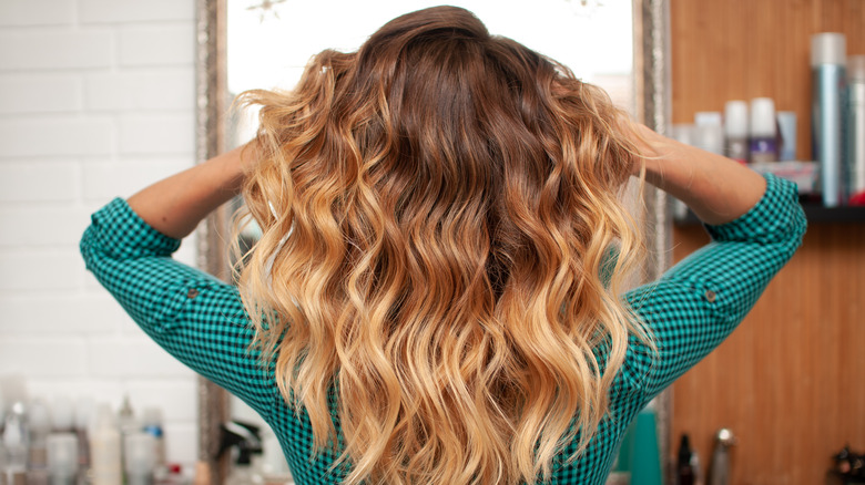 Woman with dark-to-light brown ombré hair