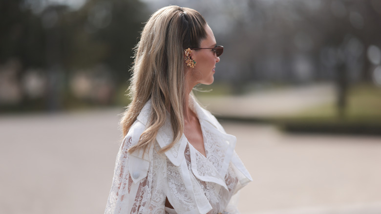 Woman with dark-to-platinum blond ombré hair