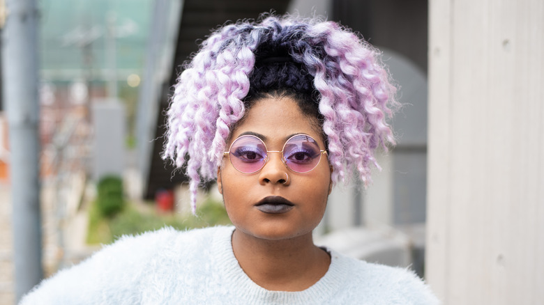 Woman with black-to-purple ombré hair