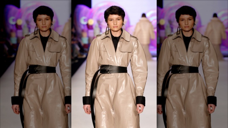 Tan leather trenchcoat with black belt