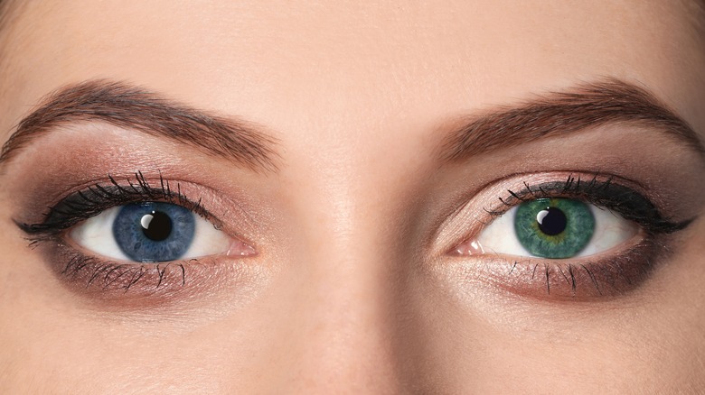 woman with blue eye and green eye heterochromia