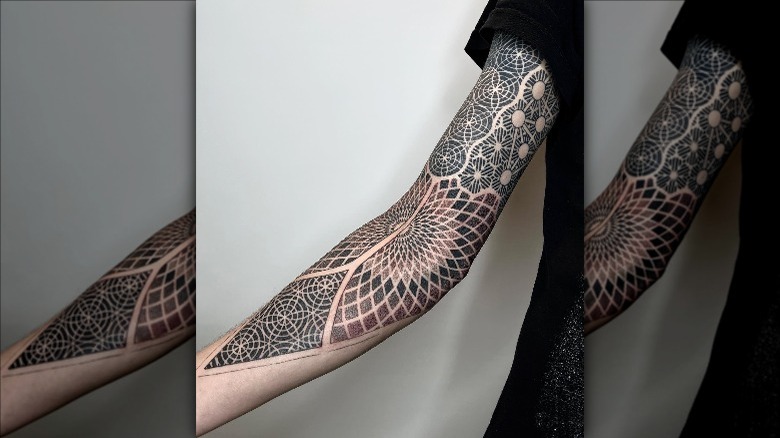 Geometric arm tattoo