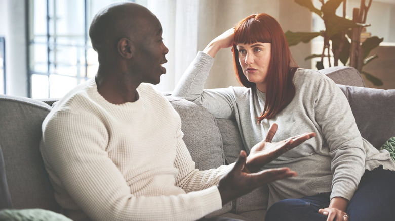 woman listening to talking man