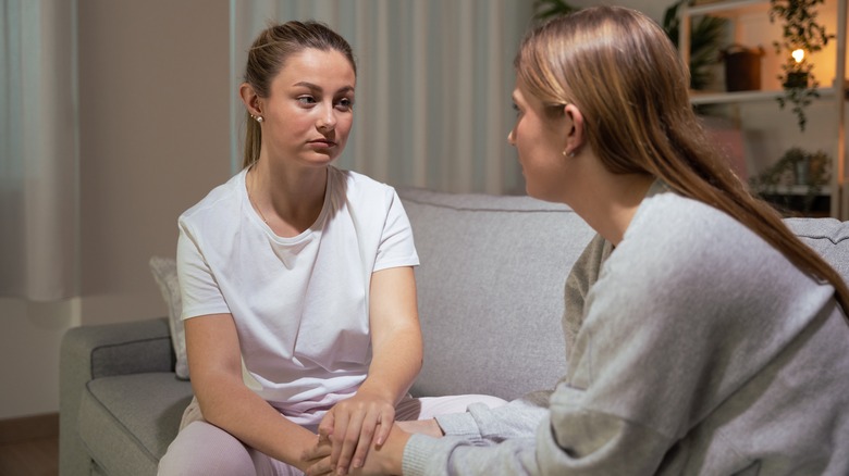 two women having serious conversation