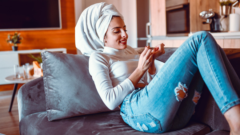 woman filing nails