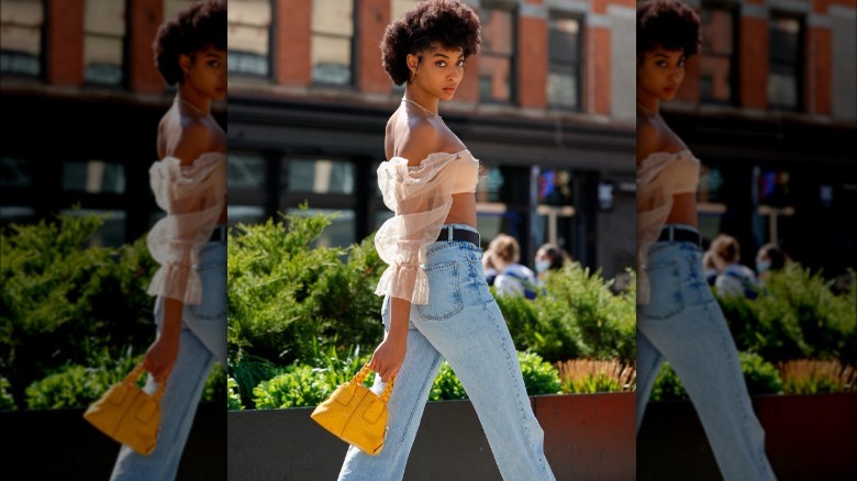 Woman in high-waisted jeans