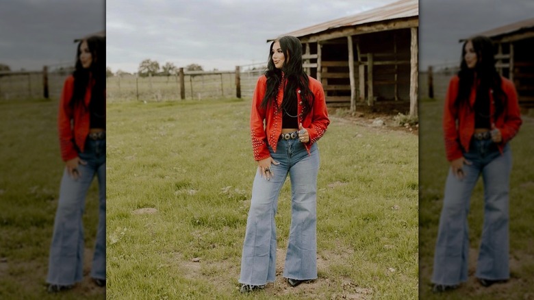 Women in red coat and jeans