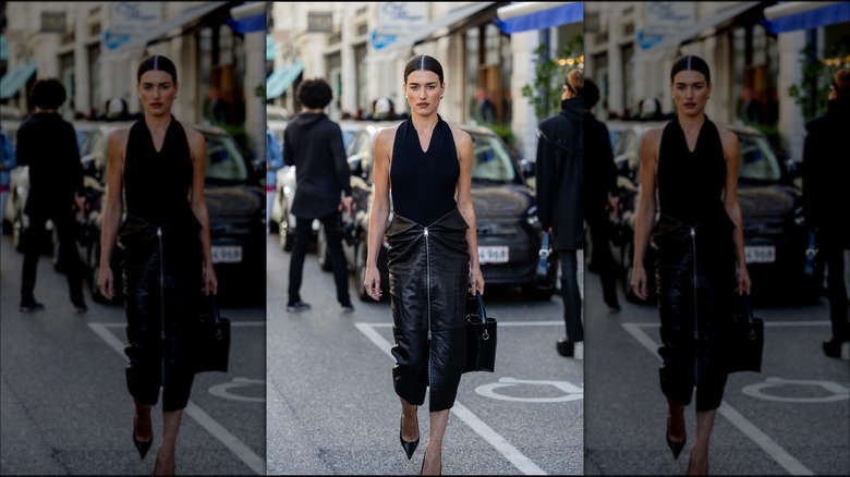 Black halter neck top and leather skirt