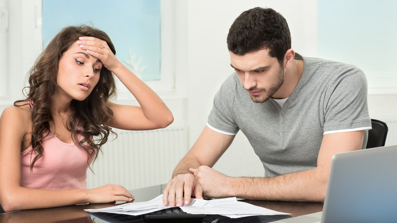 couple looking over papers