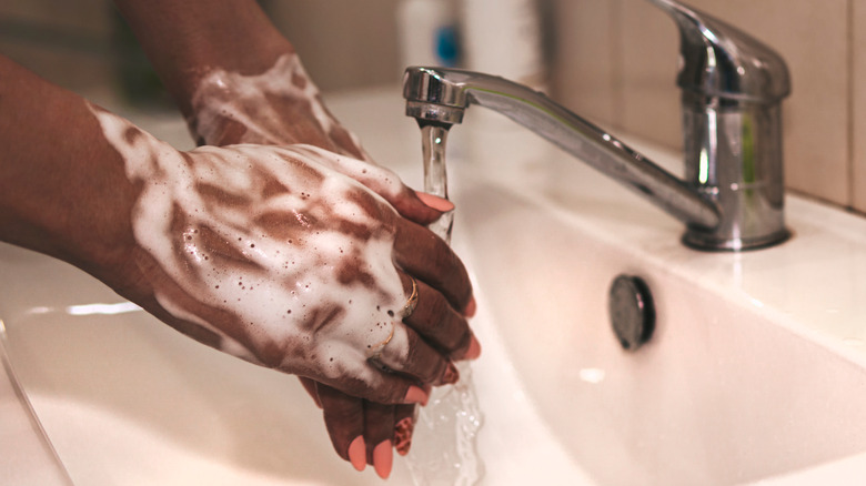 woman washing hands