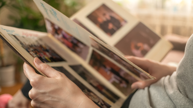 Person looking at scrapbook