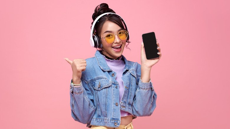 smiling woman wearing headphones