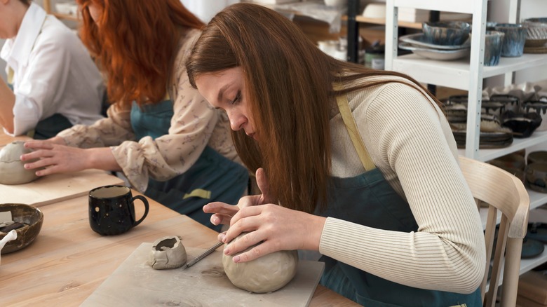 woman in pottery class
