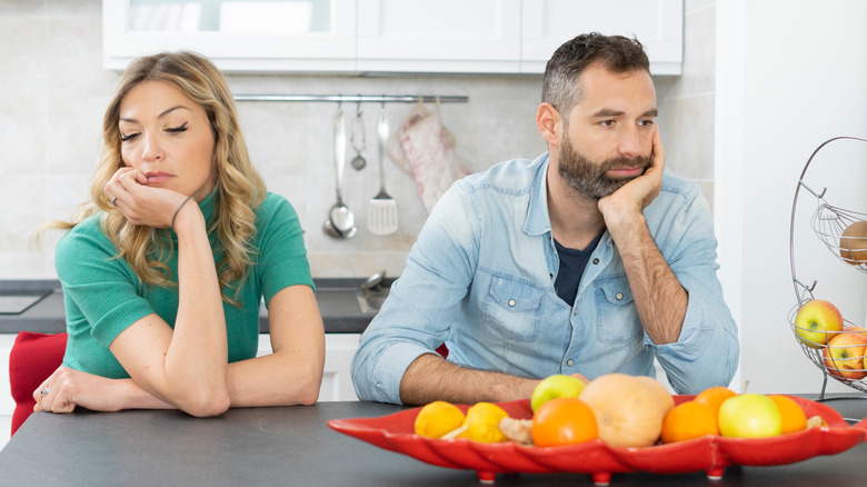 couple looking bored