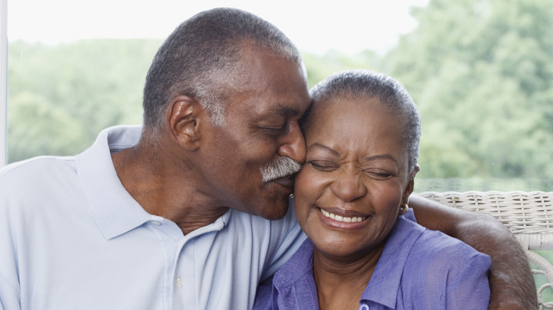 older couple cuddling