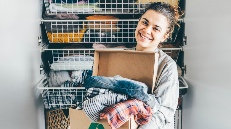 Woman organizing closet