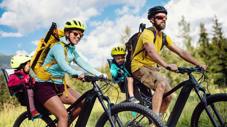 Man and woman riding bikes