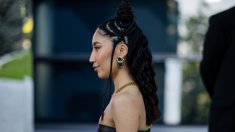 woman wearing thick flat gold chain