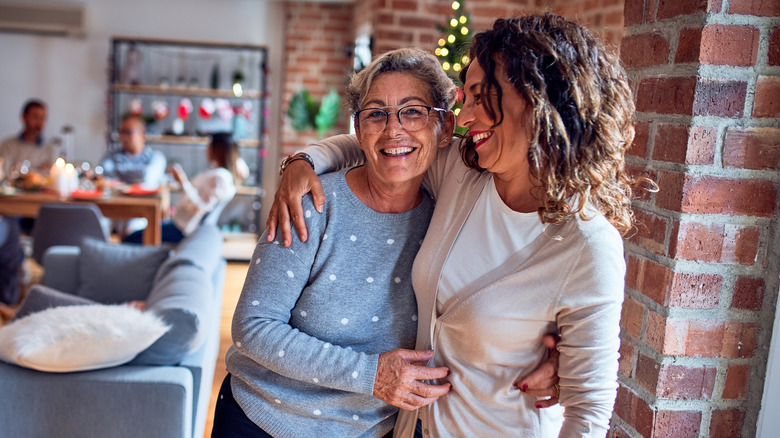 Mother and daughter hugging at Christmas