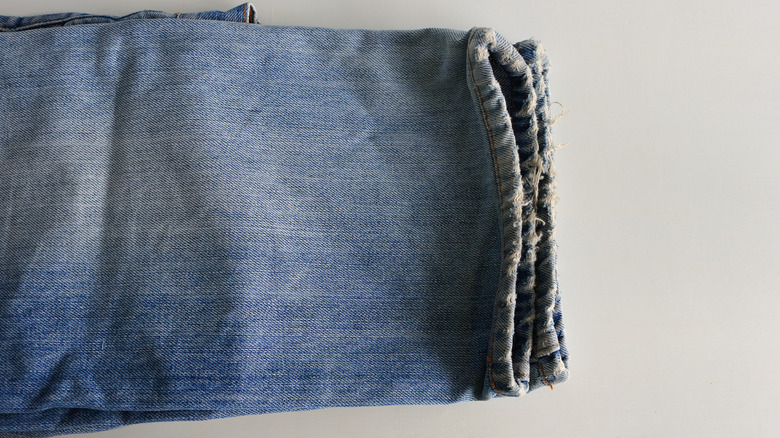 Jeans with frayed ends