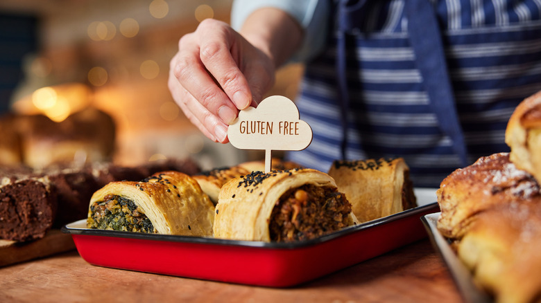 putting gluten free sign into pastries