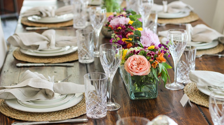 place settings and flower centerpiece