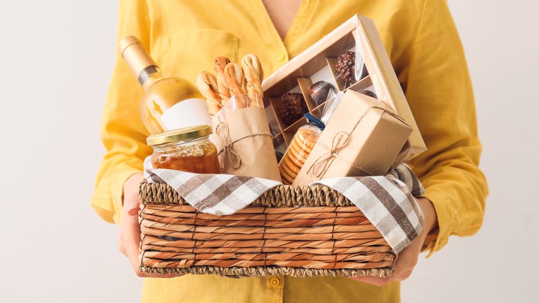 Woman holding gift basket